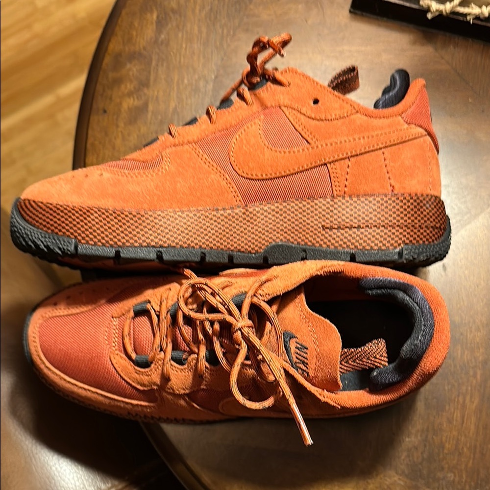 Nike Women's "Wild" Air Force 1, size 7. Never worn outside. Orange and black.